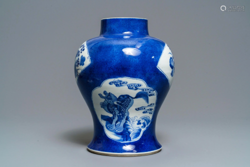 A Chinese blue and white powder blue-ground vase,