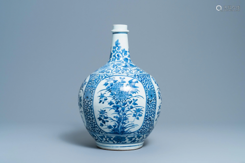 A large Japanese blue and white Arita bottle vase, E…