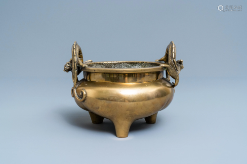 A Chinese bronze chilong-handled tripod cense…