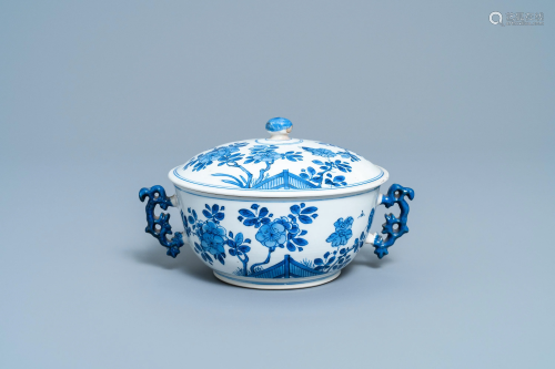 A Chinese blue and white bowl and cover with fl…