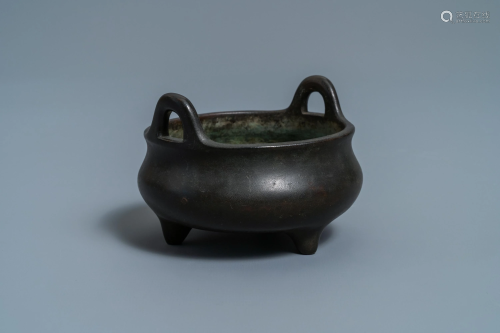 A Chinese bronze tripod censer, Xuande mark, 17/18t…