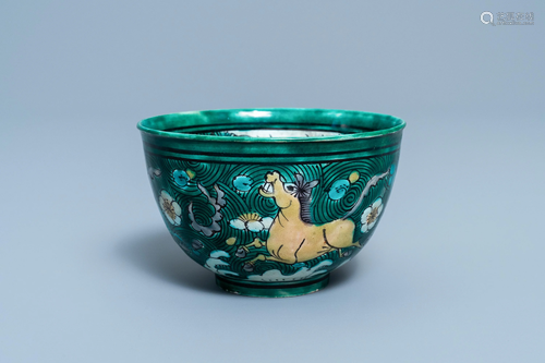 A Chinese verte biscuit bowl with horses, Kangxi