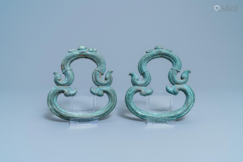 A pair of Chinese bronze ornaments, Han or la…