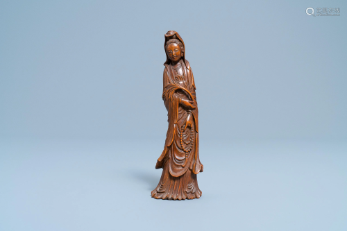 A Chinese carved wooden figure of Guanyin, 1…