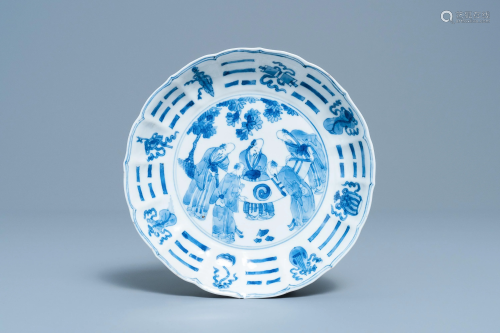 A Chinese blue and white plate with scholars ad…