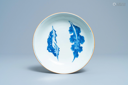 A Chinese blue and white plate with calligraphy, …