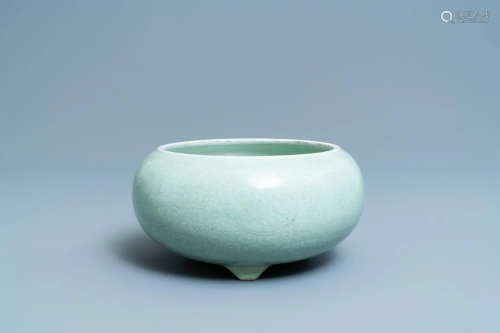A Chinese celadon-glazed tripod censer with in…