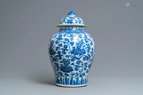 A large Chinese blue and white vase and cover with