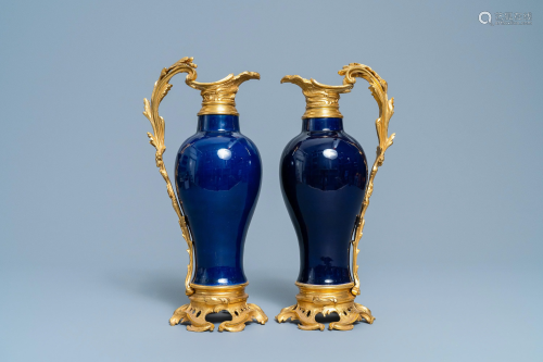 A pair of Chinese gilt bronze ewer-mounted monochr…