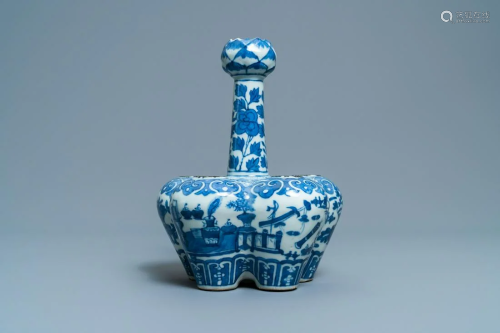 A Chinese blue and white tulip vase with antiquit…