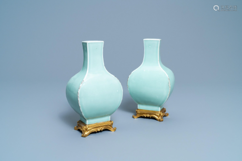 A pair of Chinese monochrome celadon vases …