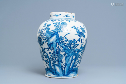 A large Dutch Delft blue and white chinoiserie vase
