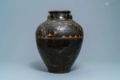 A large Chinese Cizhou vase with engraved floral