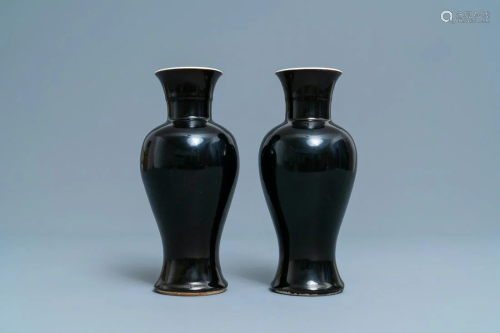 A pair of Chinese monochrome mirror black vase…