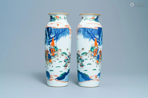 A pair of Chinese wucai rouleau vases with fig…