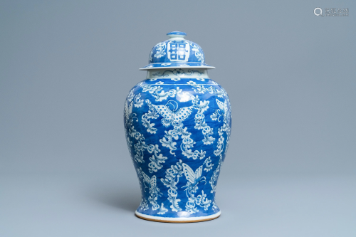 A Chinese blue and white 'butterfly' vase and cov…