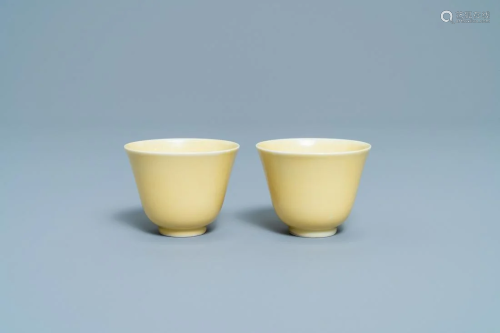 A pair of Chinese monochrome yellow wine cup…