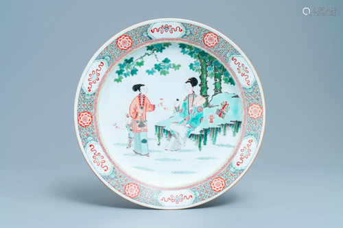 A large Chinese famille verte dish with ladies and boys