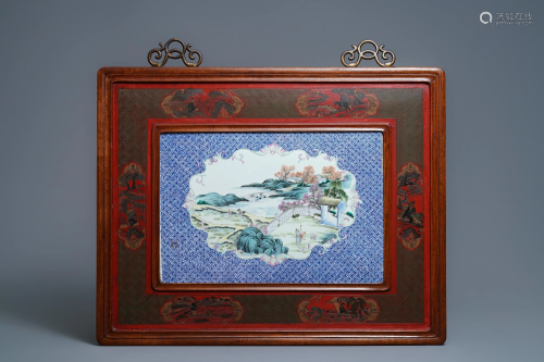 A large Chinese famille rose plaque in a lacquered