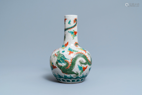 A Chinese famille verte 'dragon' bottle vase, 19/20th