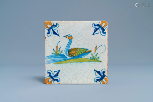 A polychrome Dutch Delft tile with a swan, 1st half