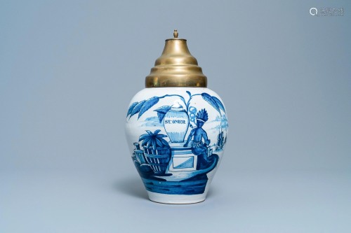 A Dutch Delft blue and white tobacco jar with an