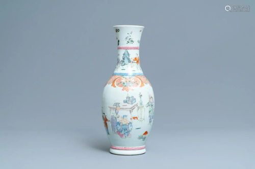 A Chinese famille rose vase with a tattoo scene from
