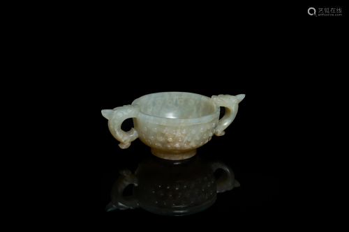 A Chinese celadon jade two-handled libation cup, Ming