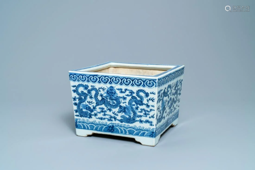 A square Chinese blue and white 'dragon' jardiniere,