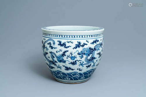 A Chinese blue and white 'dragon' fish bowl, 19t…