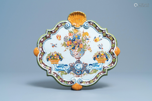 A polychrome Dutch Delft 'flower vase' plaque, 18th C.