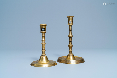 Two Flemish or Dutch knotted bronze candlesticks, …