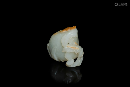 A Chinese pale celadon and russet jade model of a