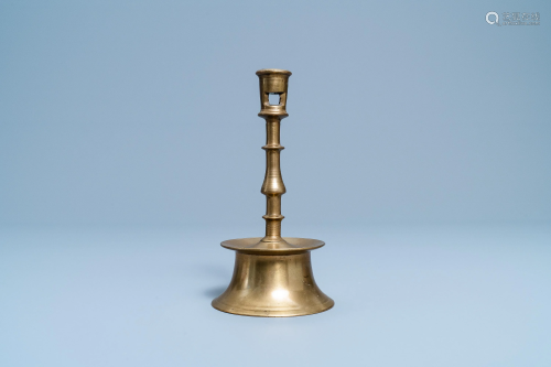 A Flemish or Dutch knotted bronze candlestick, 1…