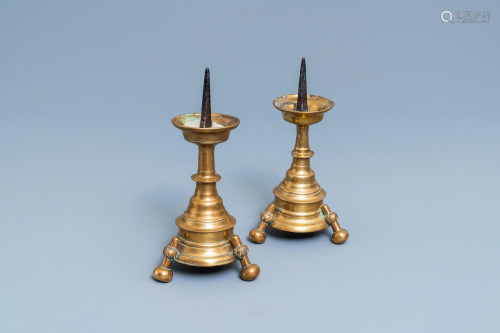 A pair of Flemish or Dutch bronze candlesticks, 16…