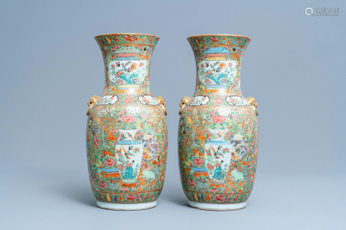 A pair of Chinese Canton famille rose vases with