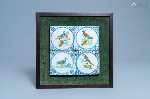 Four polychrome Dutch Delft tiles with birds within a