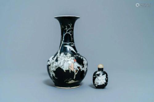 A Chinese black-ground grisaille and iron red vase and
