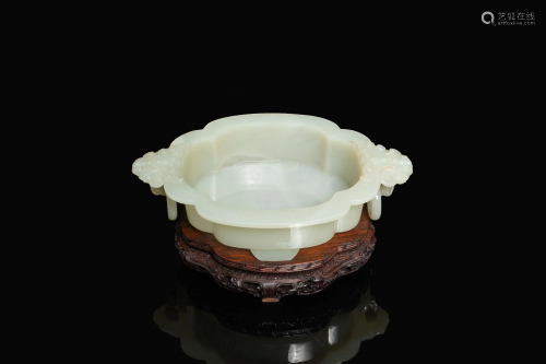 A fine Chinese white jade vessel on wooden stand,
