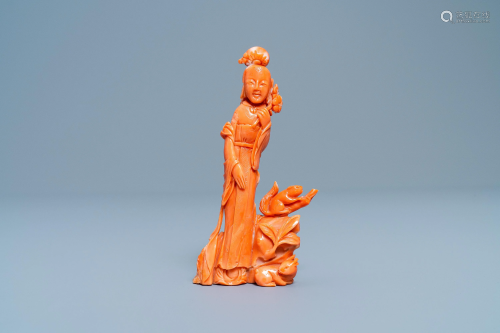 A Chinese carved red coral group of a lady, a squ…