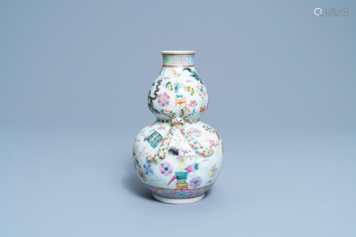 A Chinese famille rose double gourd 'antiquities' vase,