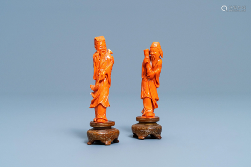 Two Chinese carved red coral figures of immortals,
