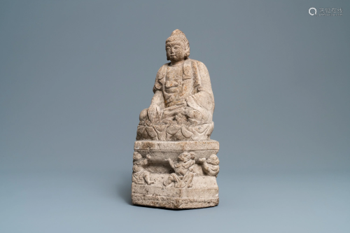 A Chinese carved stone group of Buddha on a thron…