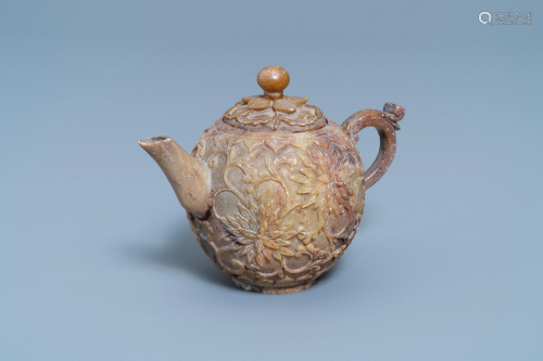 A Chinese carved soapstone teapot and cover, …