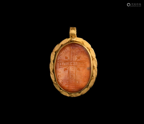 Gold Pendant with Inscribed Gemstone