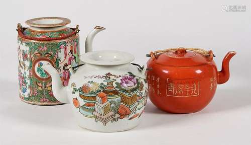 LOT of three polychrome porcelain teapots, one wit…