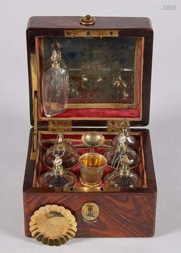 CELLAR WITH PERFUMES in gilded silver and rosewood…