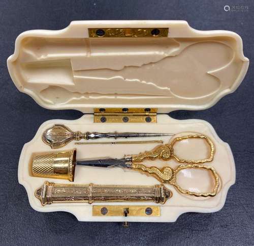 Rectangular sewing set in an ivory case with M.L. …