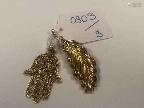 18K (750 thousandths) yellow gold set including a …