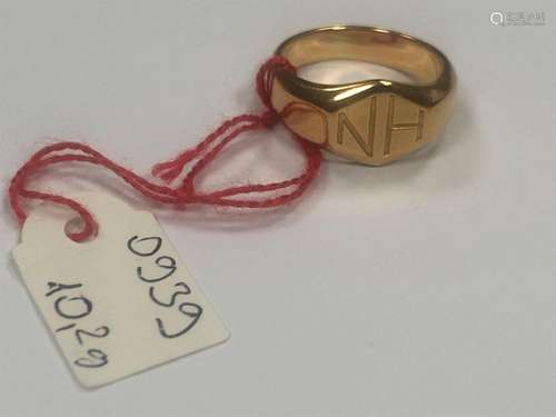 Yellow gold monogrammed signet ring. Finger size: …